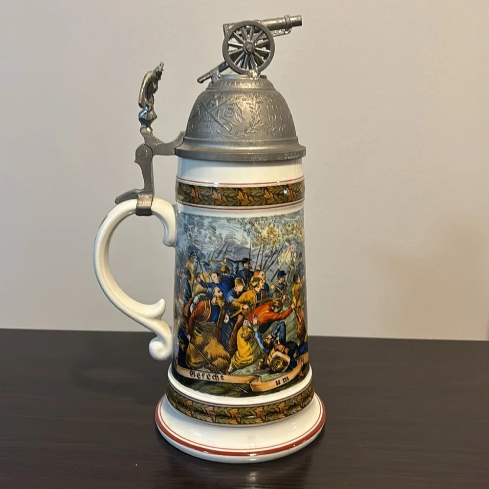 German cannon lidded beer stein with illuminated Lithopane figures in bottom